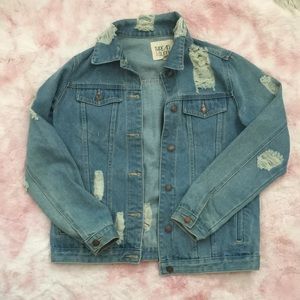 Distressed jean jacket